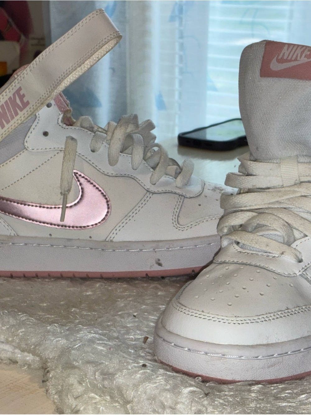Nike Kids White High-Top Sneakers with Pink Swoosh